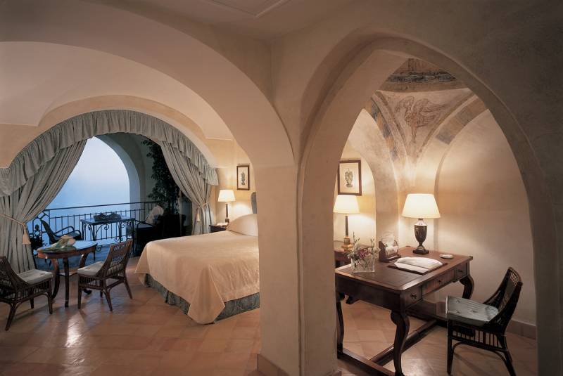 A Deluxe Junior Suite with private terrace and sea view