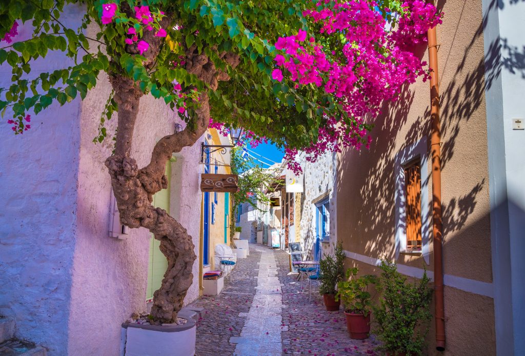 A colorful narrow alley of Ano Syros, Cycladic Greek Island