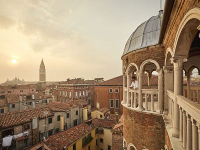 Admire Venice waking up at your feet from Scala Contarini del Bovolo